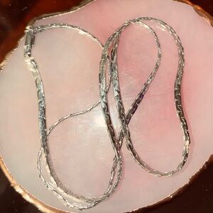 Hearing bone necklace